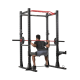Man working out with the FPC1 Full Power Cage by Inspire Fitness